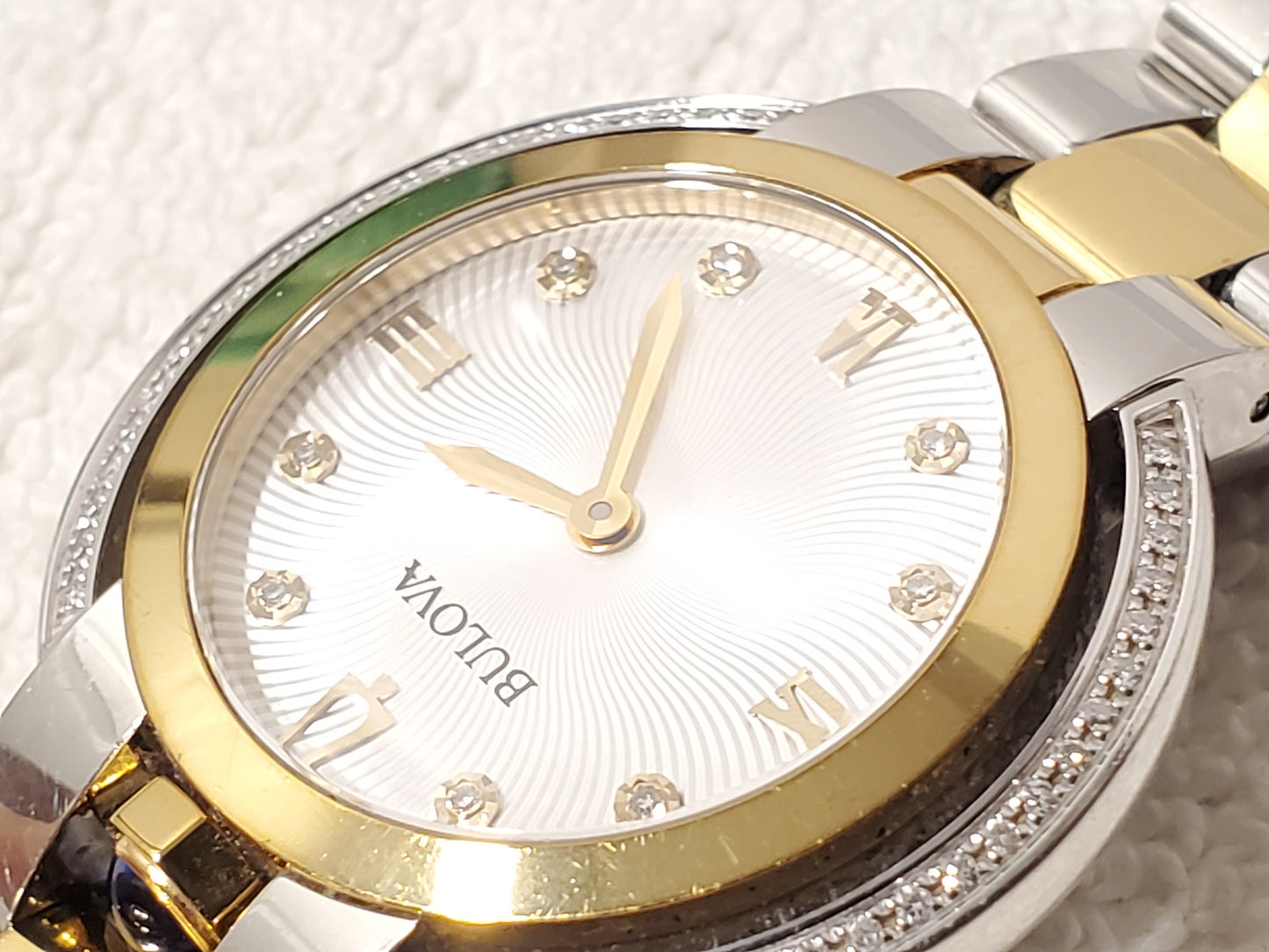 Bulova Women's Diamonds Bezel Silver Dial Gold Tone Sapphire Crystal Watch SS