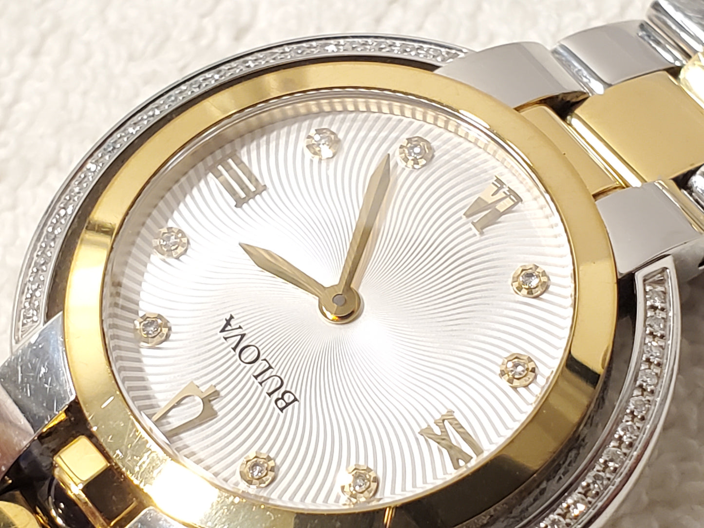 Bulova Women's Diamonds Bezel Silver Dial Gold Tone Sapphire Crystal Watch SS