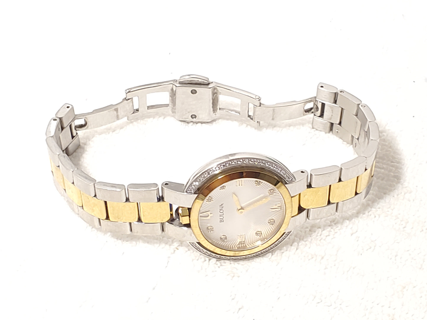 Bulova Women's Diamonds Bezel Silver Dial Gold Tone Sapphire Crystal Watch SS