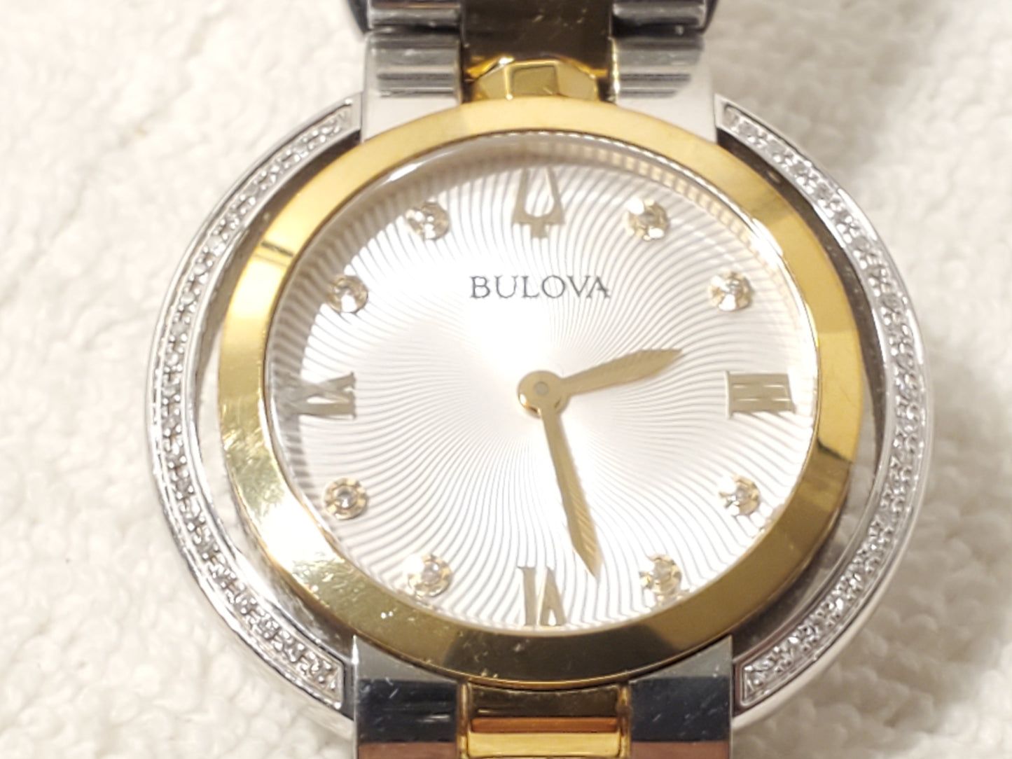 Bulova Women's Diamonds Bezel Silver Dial Gold Tone Sapphire Crystal Watch SS