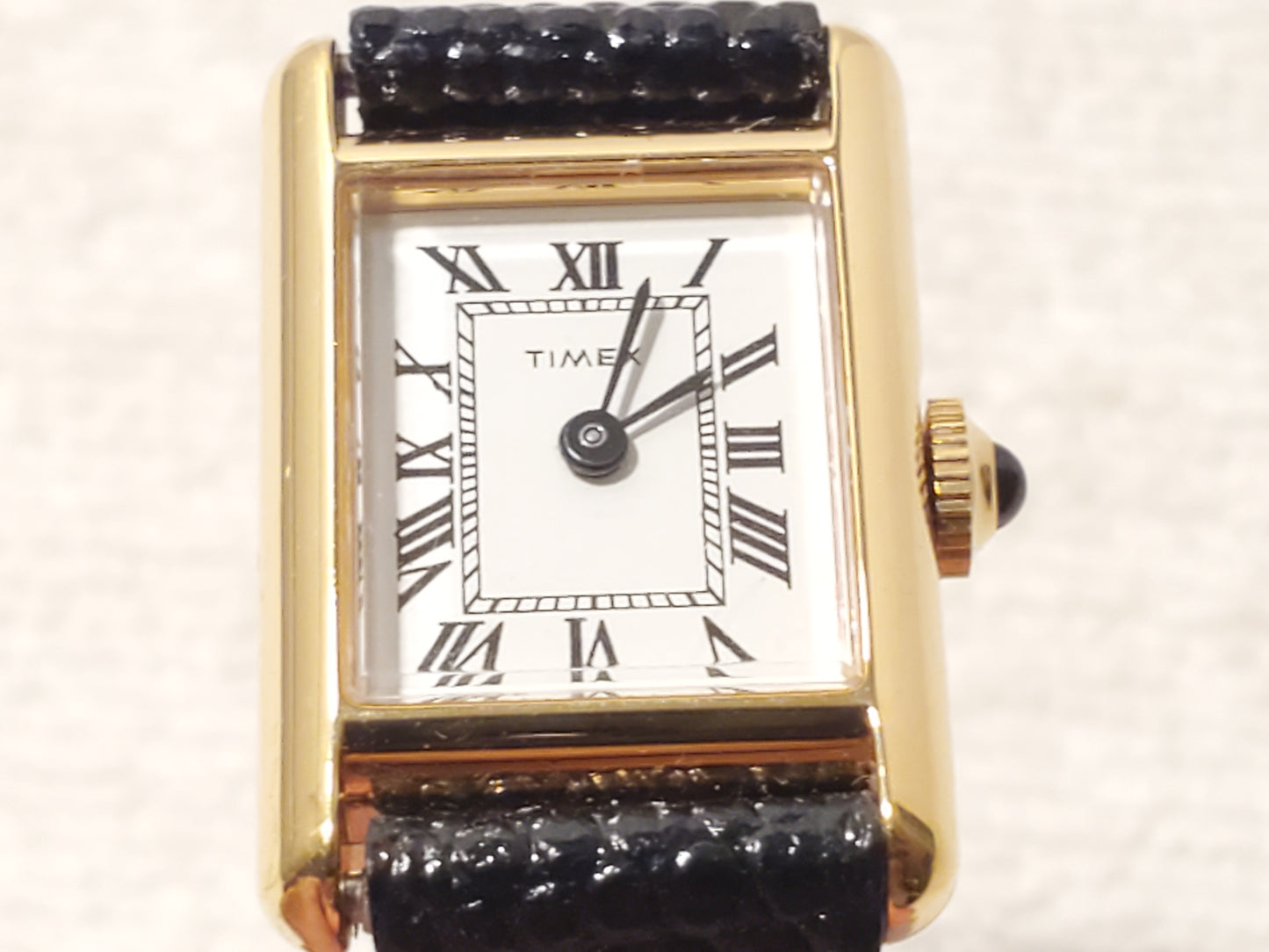 Vintage Timex Women's Tank Wind Up Gold Tone Watch Roman Numerals White Dial SS