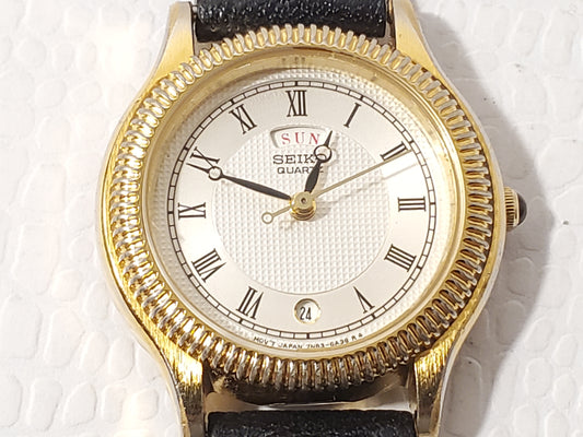 Vintage Seiko Women's Day Date Watch Gold Tone Roman Numerals Black Leather Band