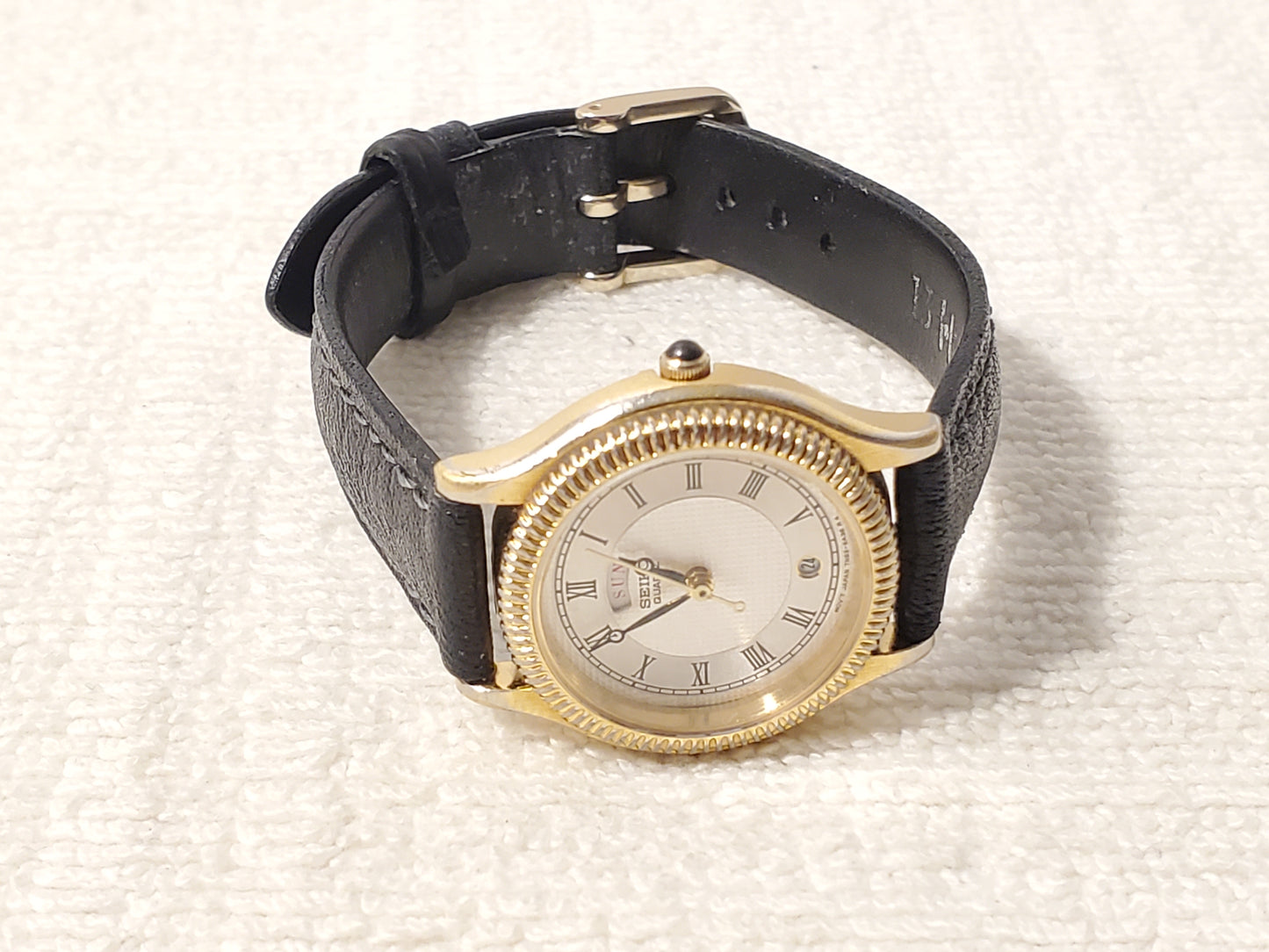 Vintage Seiko Women's Day Date Watch Gold Tone Roman Numerals Black Leather Band
