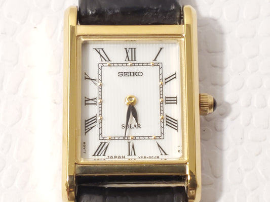 Vintage Seiko Solar Women's Tank Watch White Dial Roman Numerals Gold Tone SS