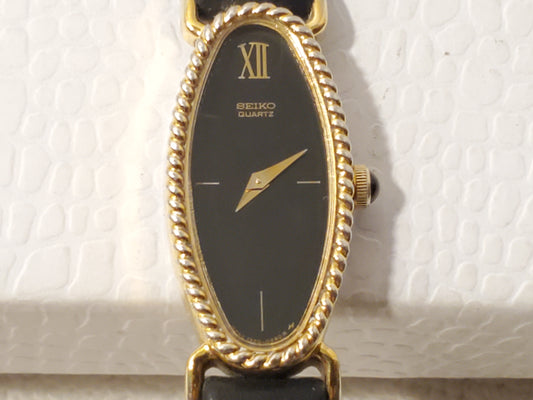 Vintage Seiko Women’s Gold Tone Watch Black Dial Six Jewels Leather Strap Petite