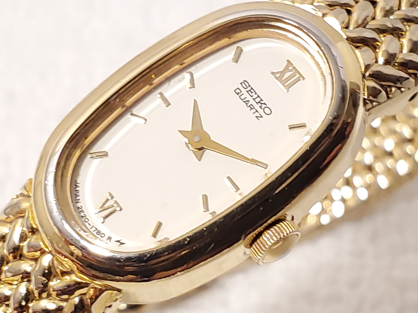 Vintage Seiko Women's Gold Tone Roman Numerals One Jewel Quartz Watch White Dial