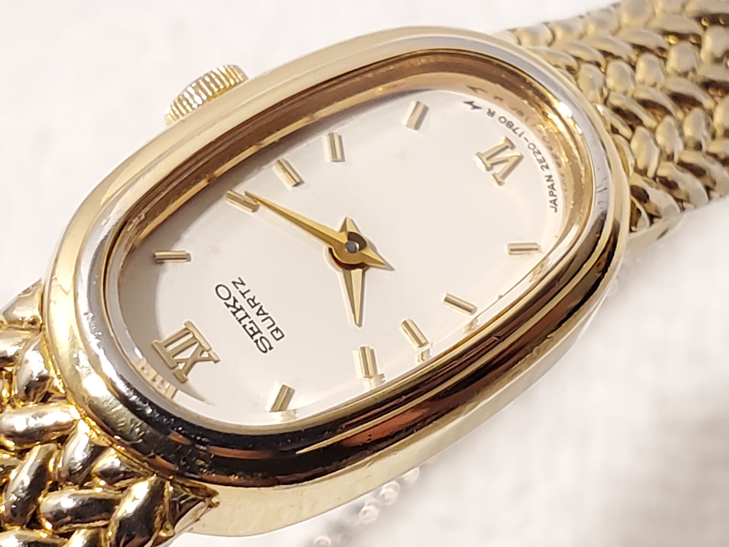 Vintage Seiko Women's Gold Tone Roman Numerals One Jewel Quartz Watch White Dial