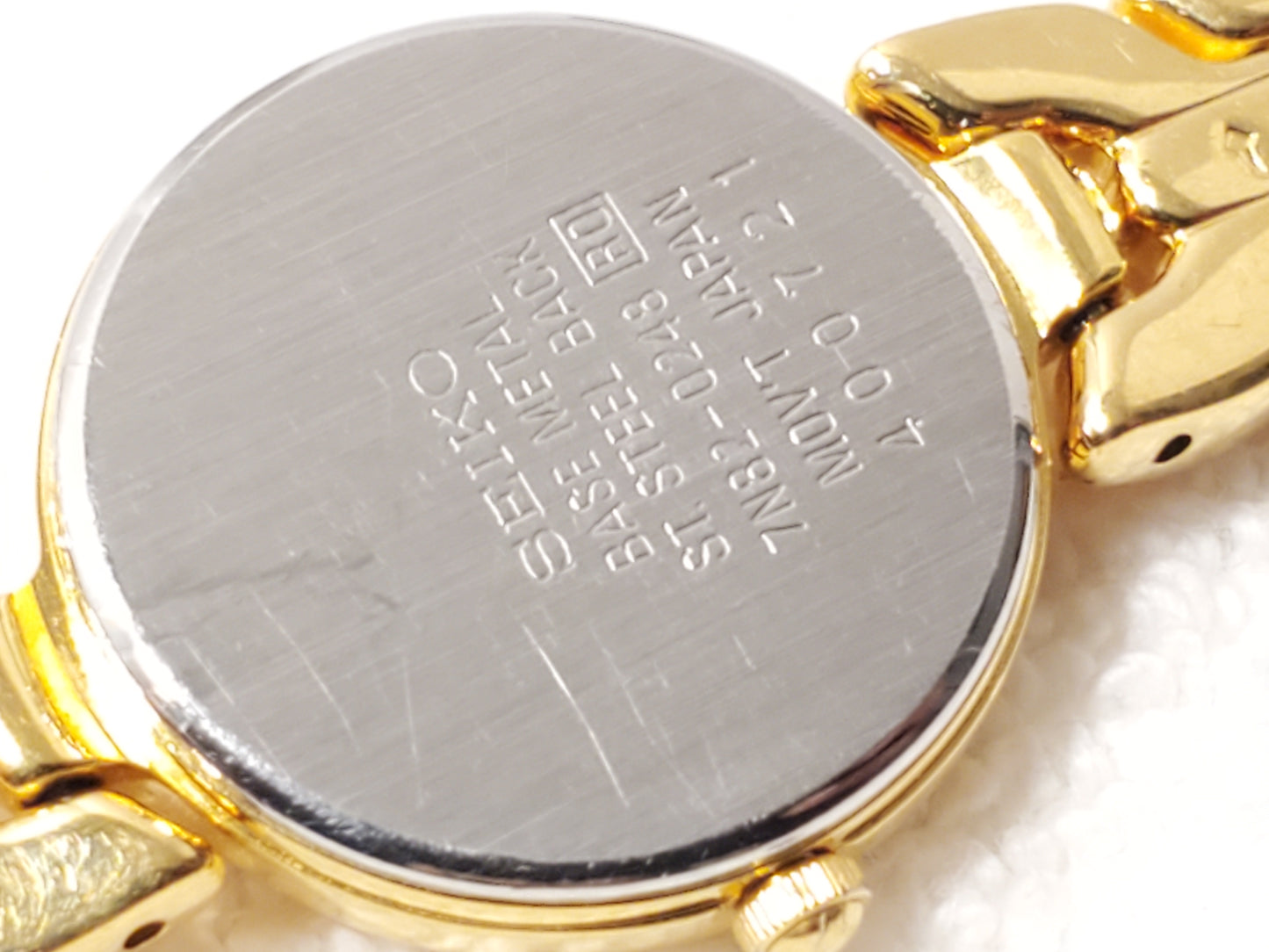 Vintage Seiko Women's Gold Tone Date Quartz Watch Black Dial Base Metal S Steel