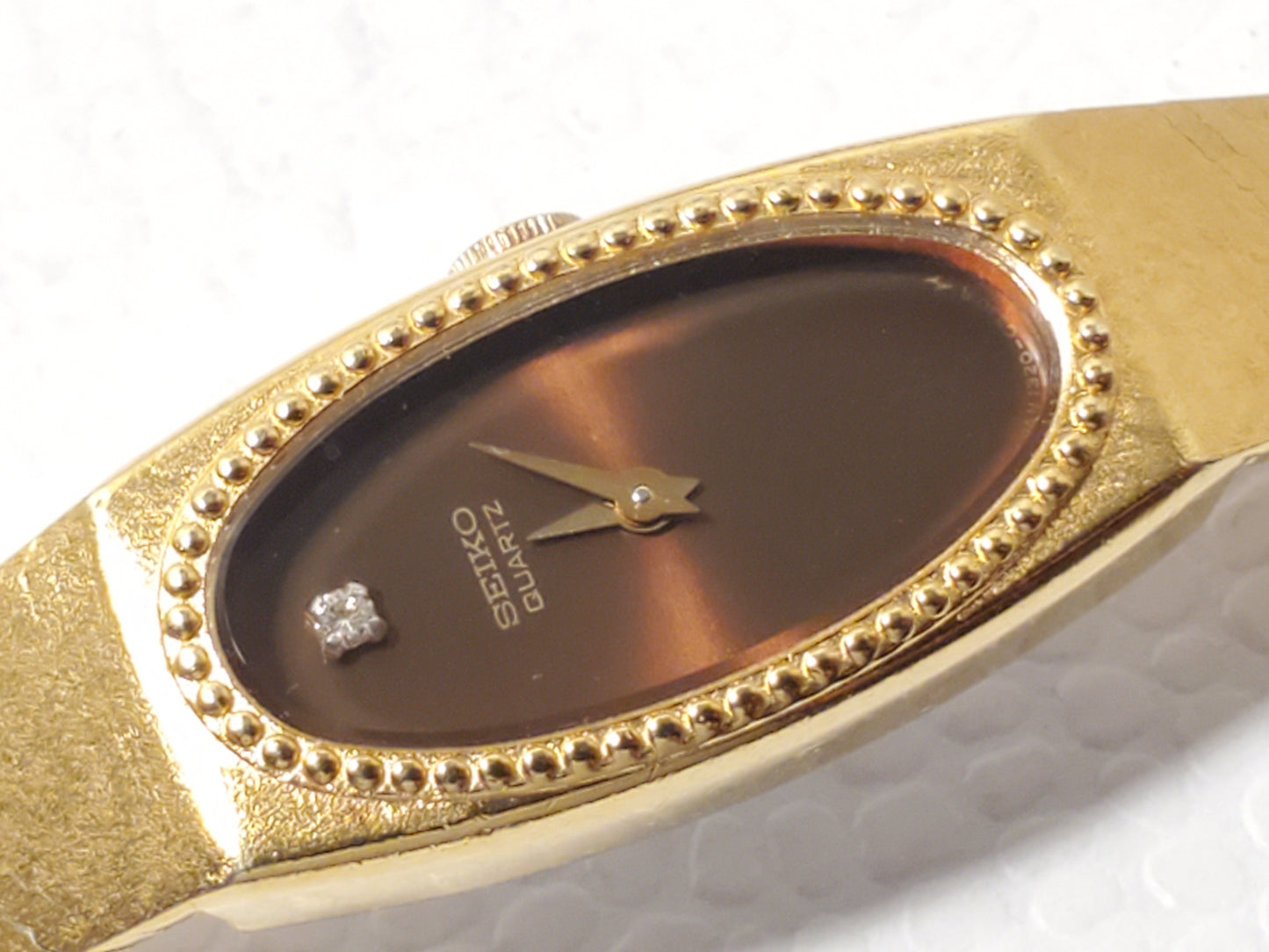 Vintage Seiko Women's Gold Plated Quartz Watch Brown One Diamond Dial Six Jewels