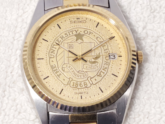 Vintage Seiko SQ Mens Day Date Quartz Watch Gold Tone Two Jewels Stainless Steel