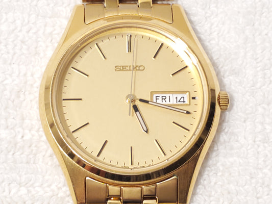 Vintage Seiko Men's Gold Tone Day Date Quartz Watch One Jewel Stainless Steel