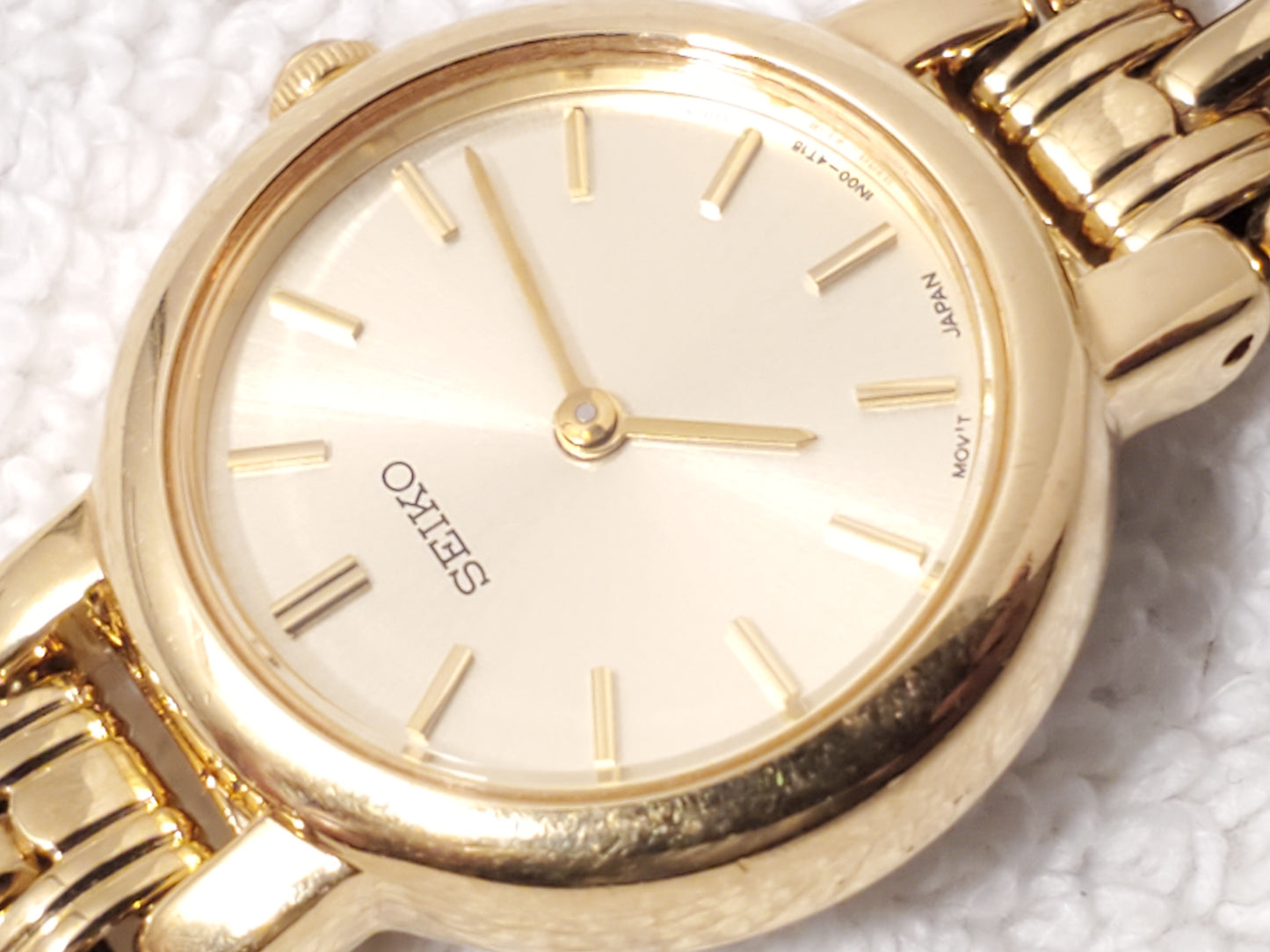 Vintage Seiko Women Gold Tone Stainless Steel Petite Quartz Watch Champagne Dial