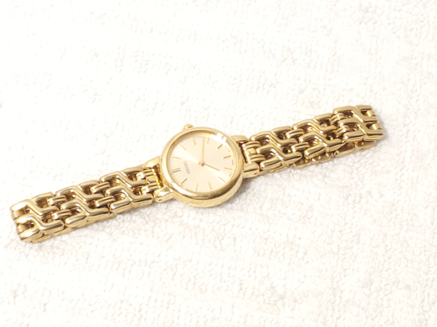Vintage Seiko Women Gold Tone Stainless Steel Petite Quartz Watch Champagne Dial