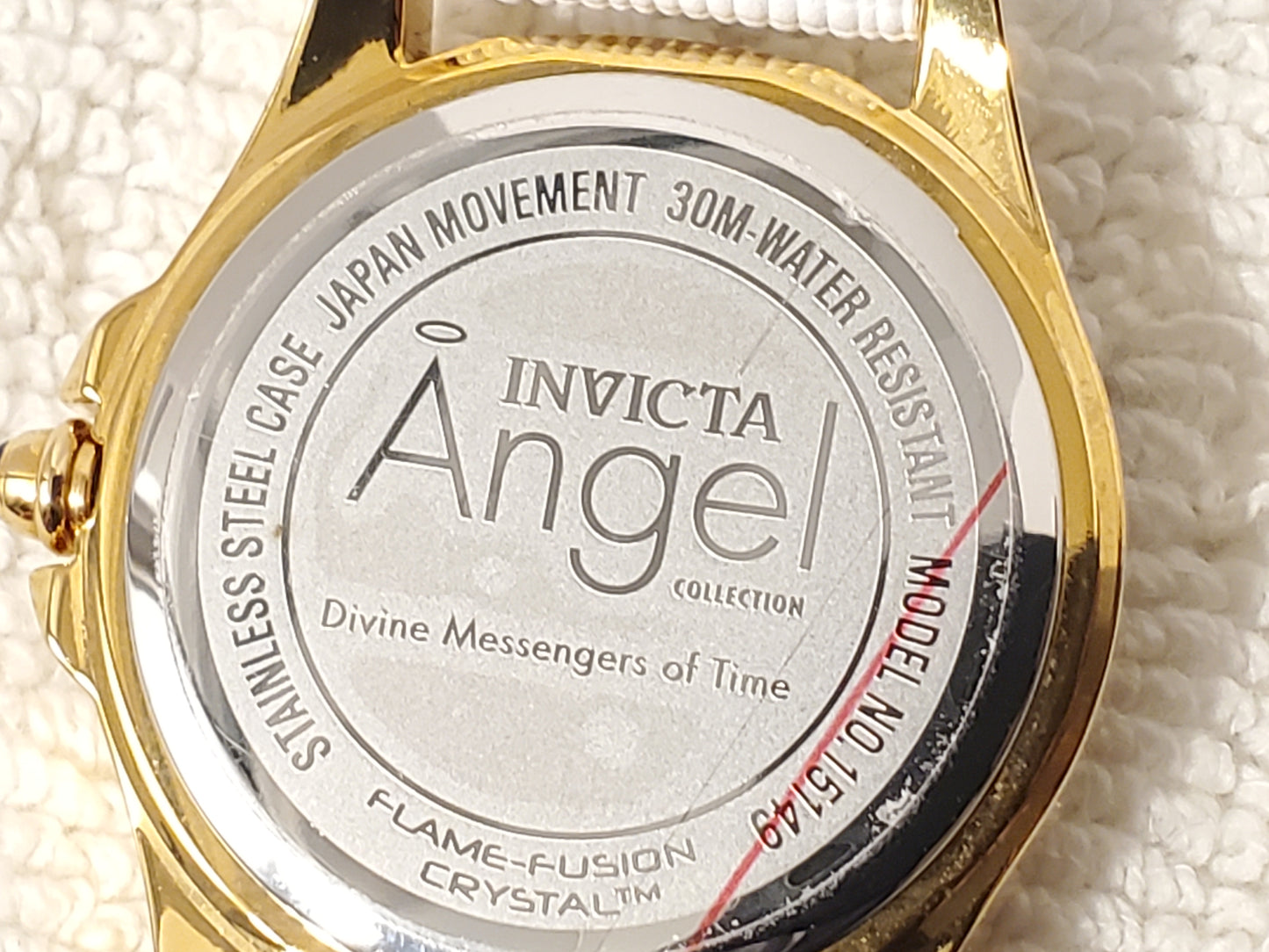 Invicta Angel Women's Quartz Watch Gold Tone White Leather Strap Blue Stone
