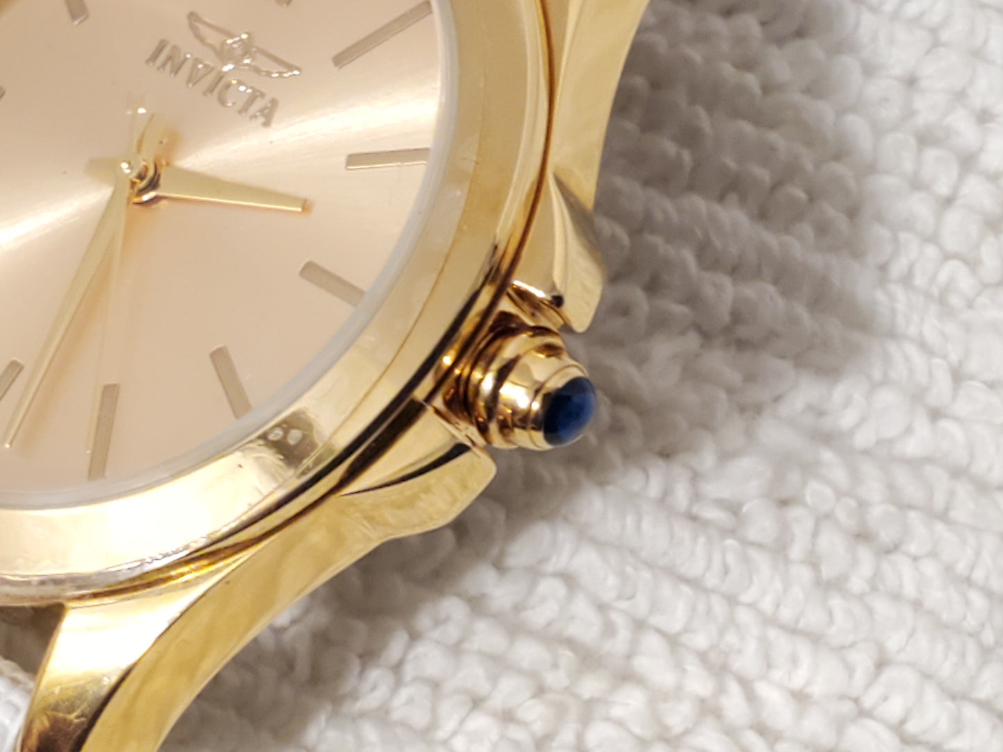 Invicta Angel Women's Quartz Watch Gold Tone White Leather Strap Blue Stone