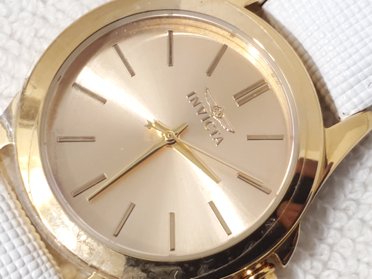 Invicta Angel Women's Quartz Watch Gold Tone White Leather Strap Blue Stone