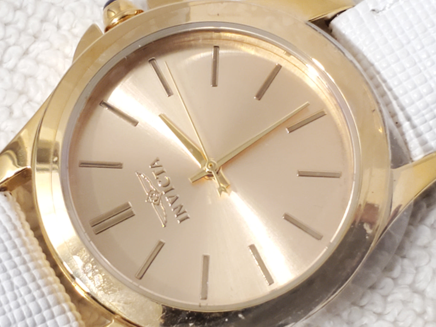 Invicta Angel Women's Quartz Watch Gold Tone White Leather Strap Blue Stone