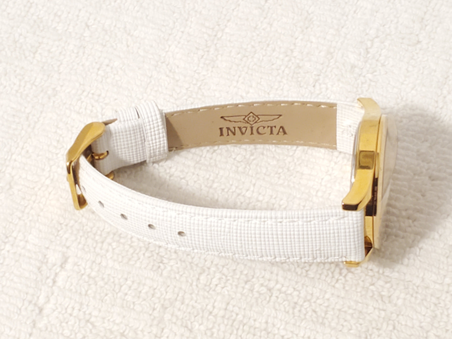 Invicta Angel Women's Quartz Watch Gold Tone White Leather Strap Blue Stone