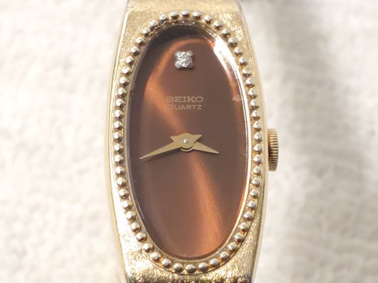 Vintage Seiko Women's Gold Plated Quartz Watch Brown One Diamond Dial Six Jewels