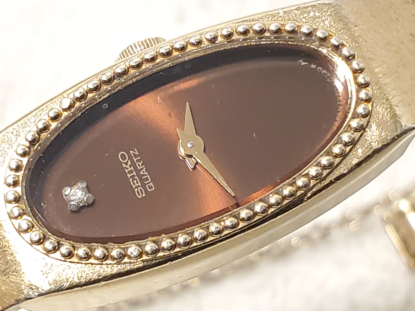 Vintage Seiko Women's Gold Plated Quartz Watch Brown One Diamond Dial Six Jewels