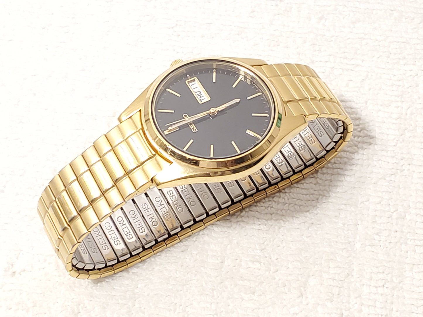 Vintage Seiko Men's Day Date Gold Tone Watch One Jewel Black Dial Flex Band SS