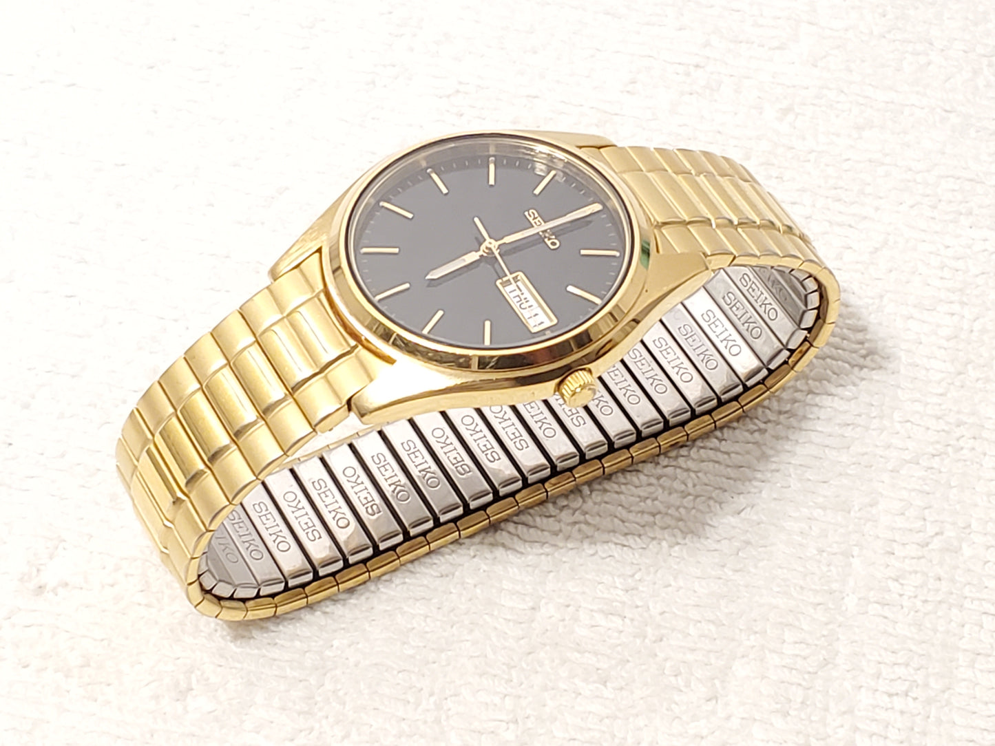Vintage Seiko Men's Day Date Gold Tone Watch One Jewel Black Dial Flex Band SS
