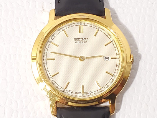Vintage Seiko Men's Gold Tone Date Quartz Watch Black Leather Strap S Steel