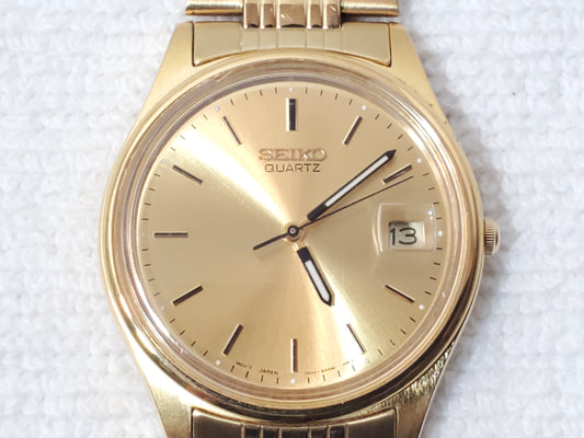 Vintage Seiko Gold Tone Men’s Date Quartz Watch Stainless Steel WR 30 Meters