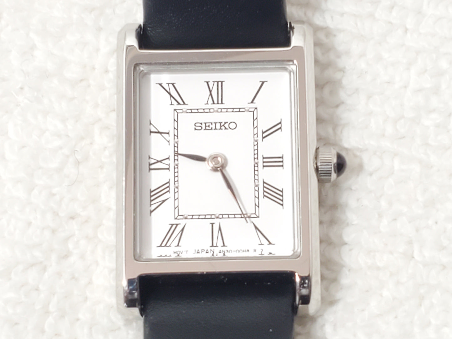 Vintage Seiko Women's Tank Watch White Dial Black Roman Numerals Leather Strap
