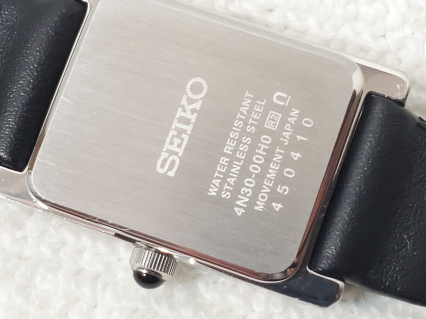 Vintage Seiko Women's Tank Watch White Dial Black Roman Numerals Leather Strap