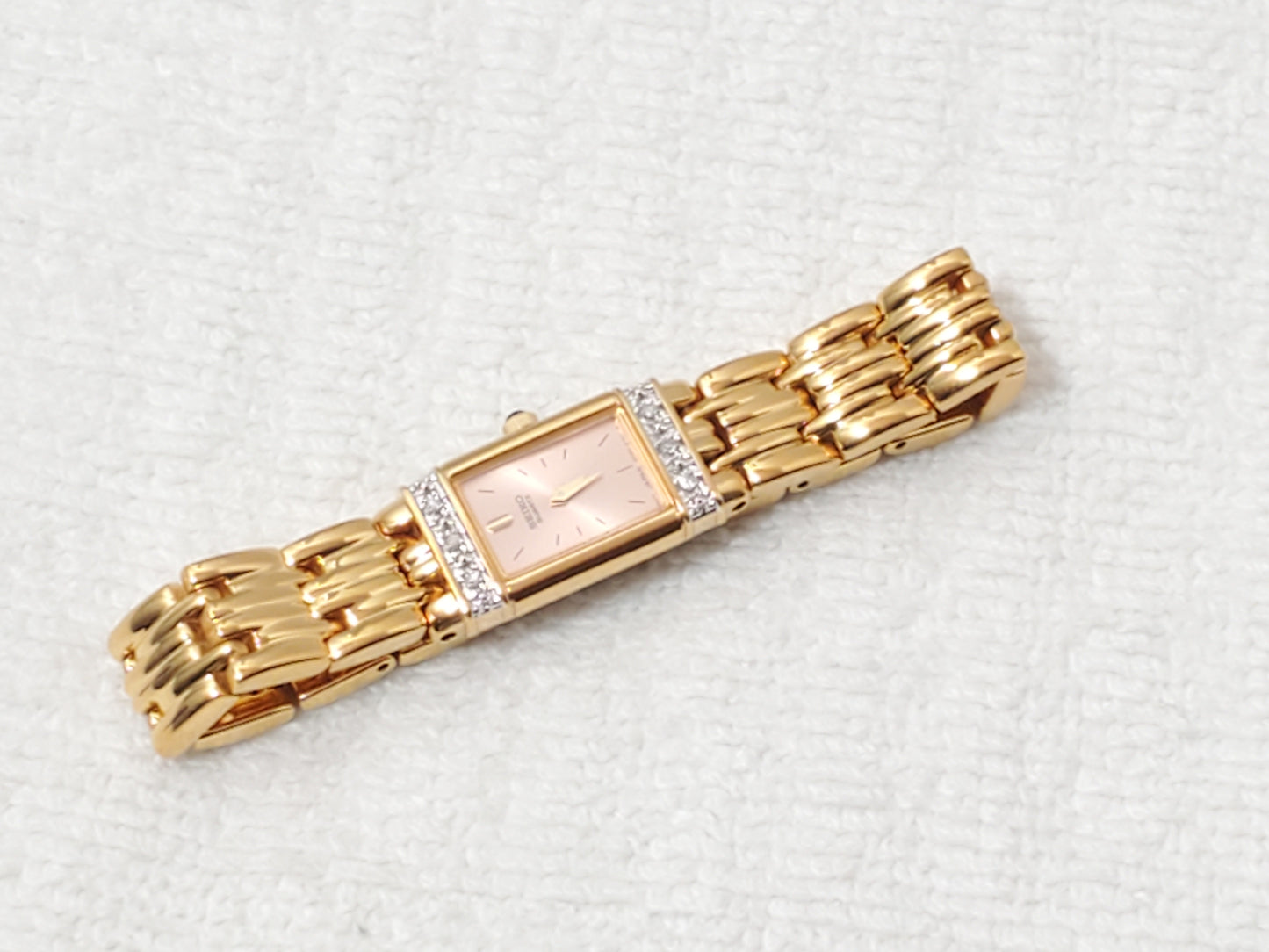 Vintage Seiko Women's Tank Watch Gold Tone Diamonds Bezel One Jewel Pink Dial SS