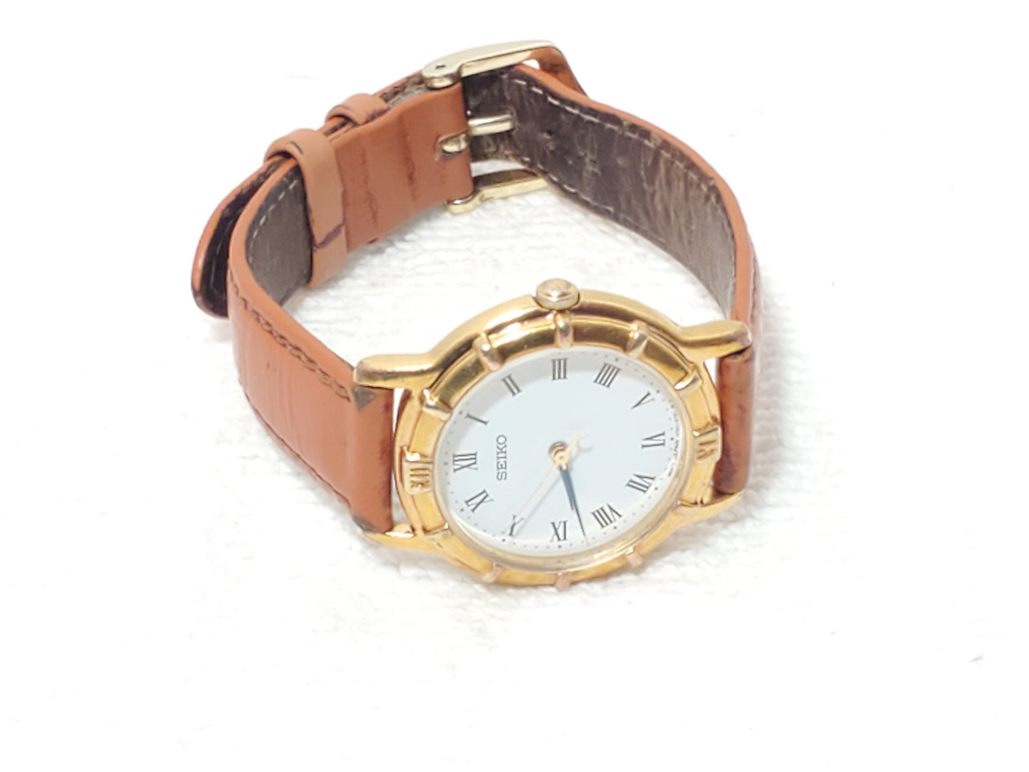 Vintage Seiko Women Gold Tone Watch White Dial Black Roman Numerals Leather Band