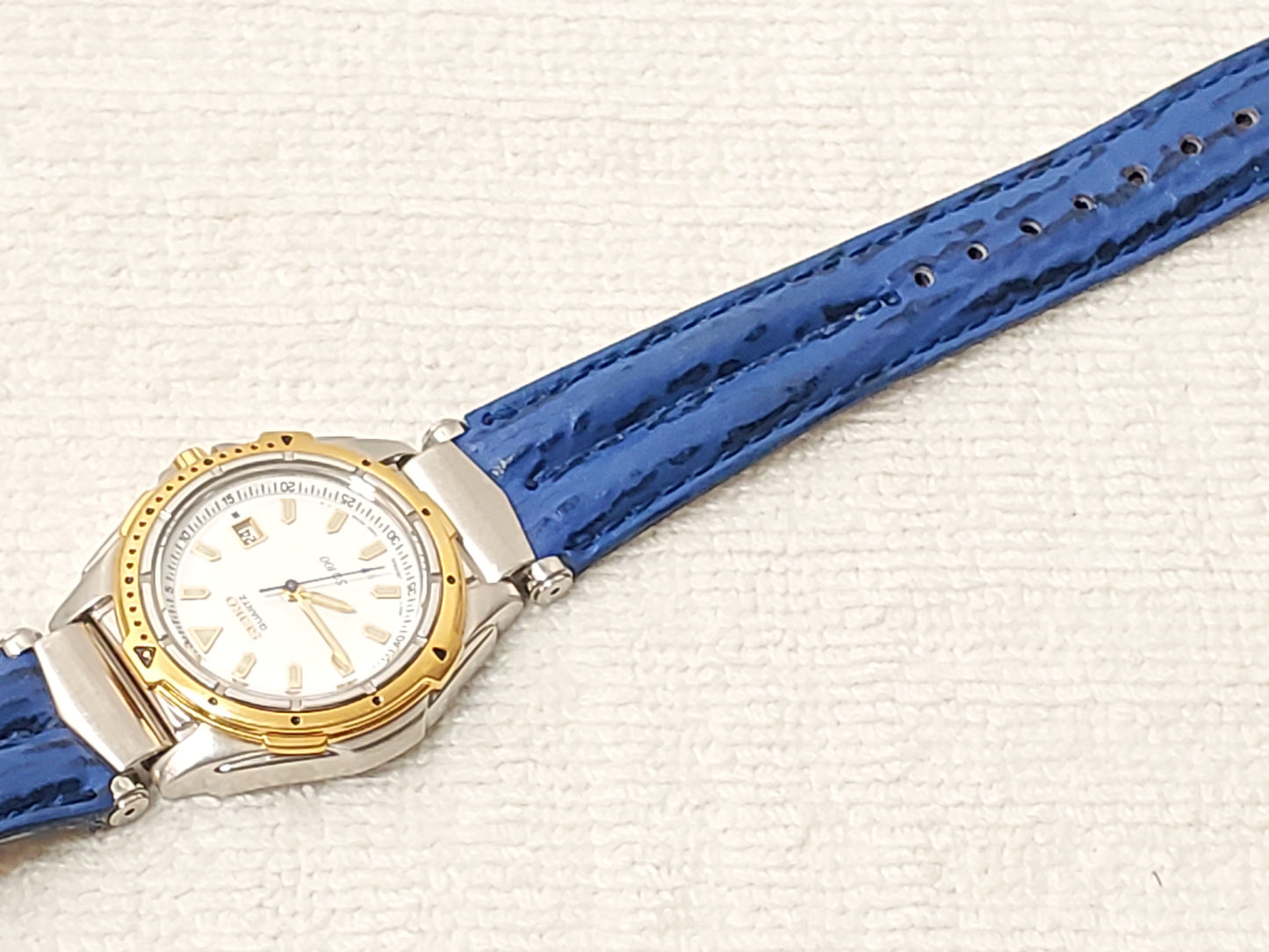 Seiko Women's Vintage Gold Tone Date Quartz Watch White Dial Blue Leather Band