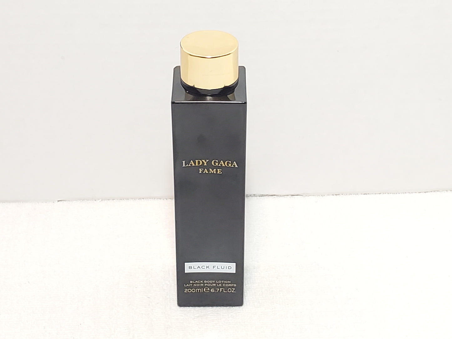 Pre-owned bottle of Lady Gaga Fame Black Body Lotion 6.7 oz / 200ml France