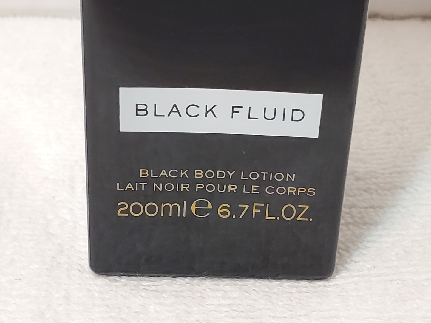 Pre-owned bottle of Lady Gaga Fame Black Body Lotion 6.7 oz / 200ml France