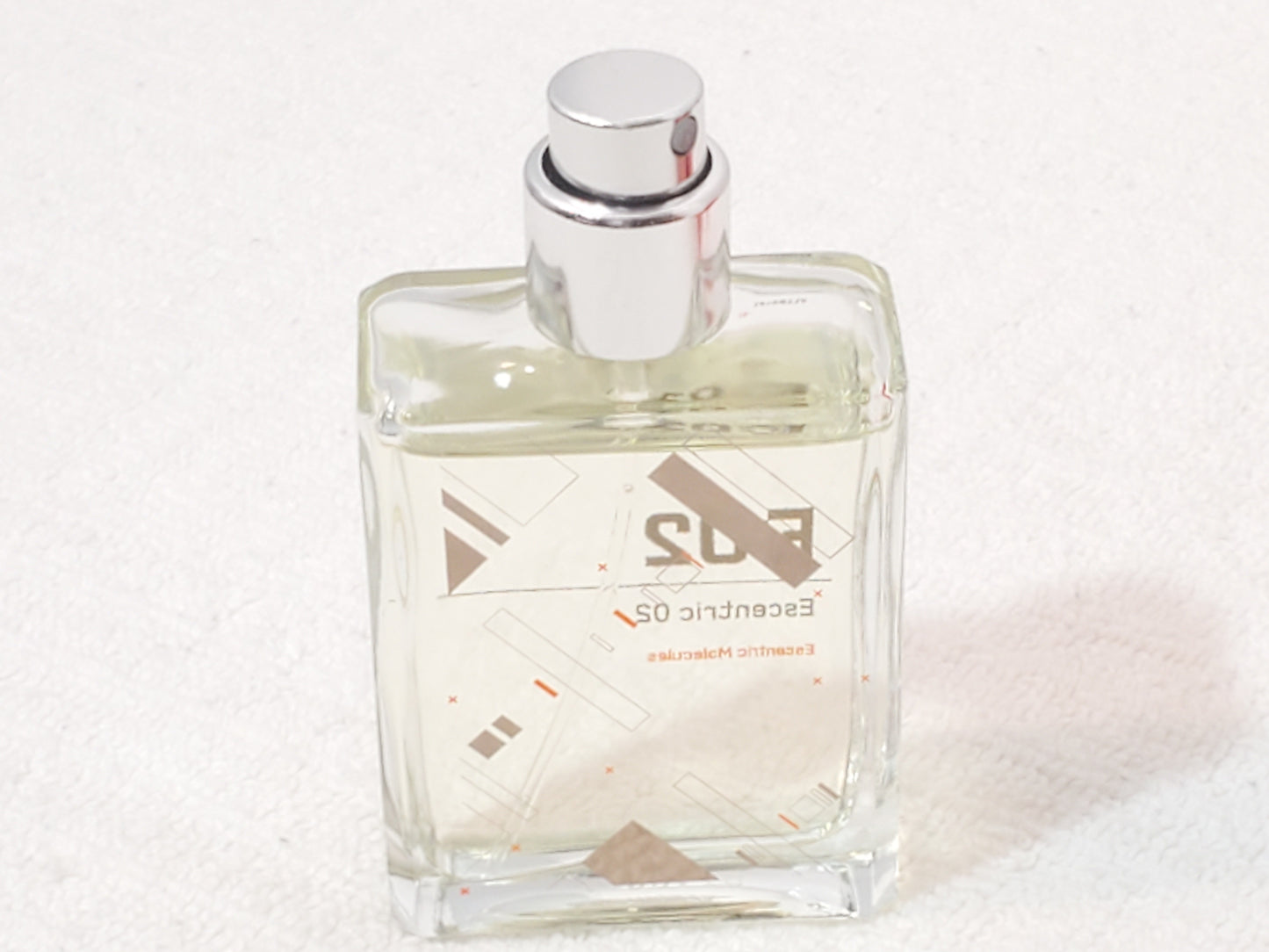 Escentric 02 by Escentric Molecules 1oz 30ml Travel Spray Orange Metal Case