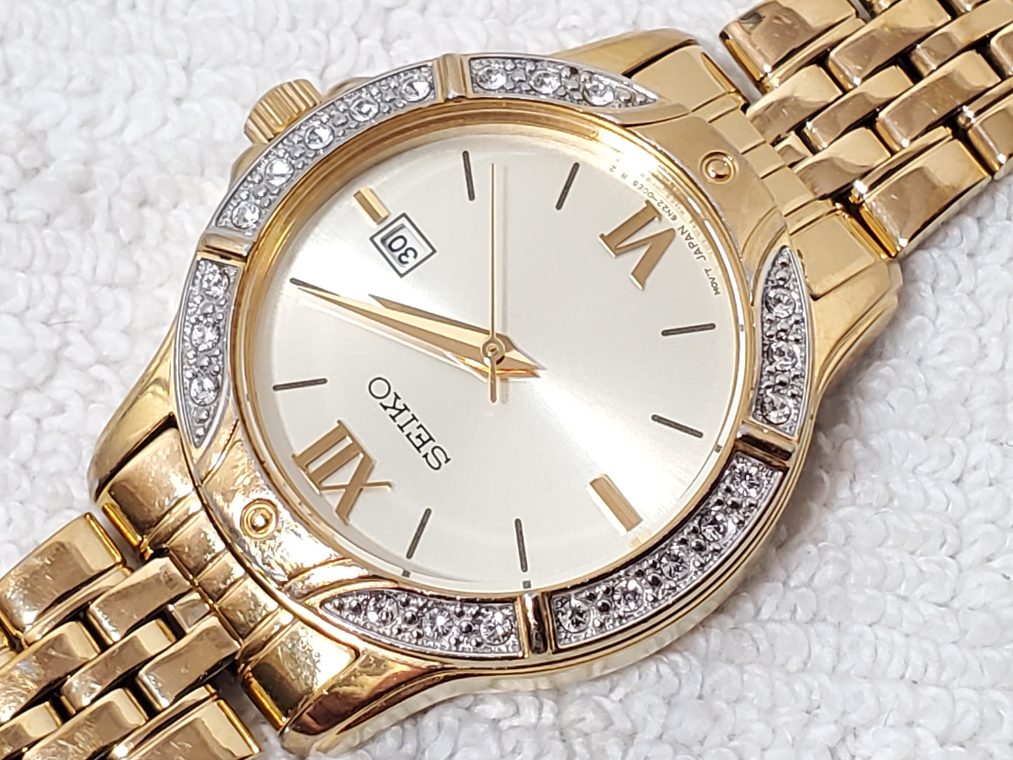 Seiko Women’s Date Quartz Watch Swarovski Crystal Gold Tone Roman Numerals