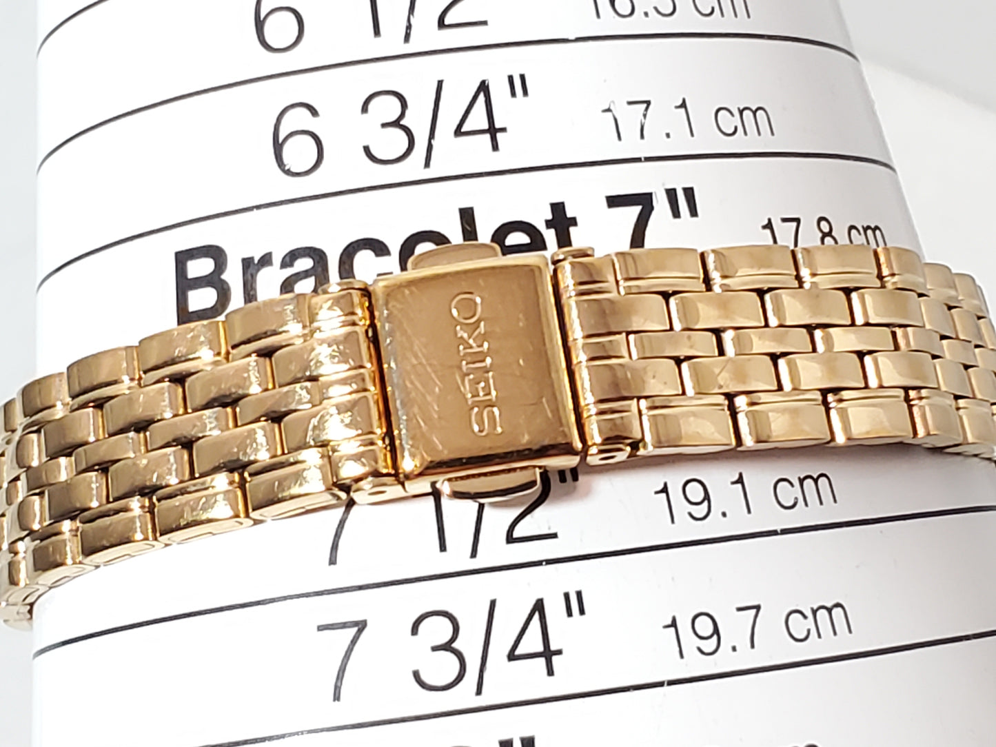 Seiko Women’s Date Quartz Watch Swarovski Crystal Gold Tone Roman Numerals