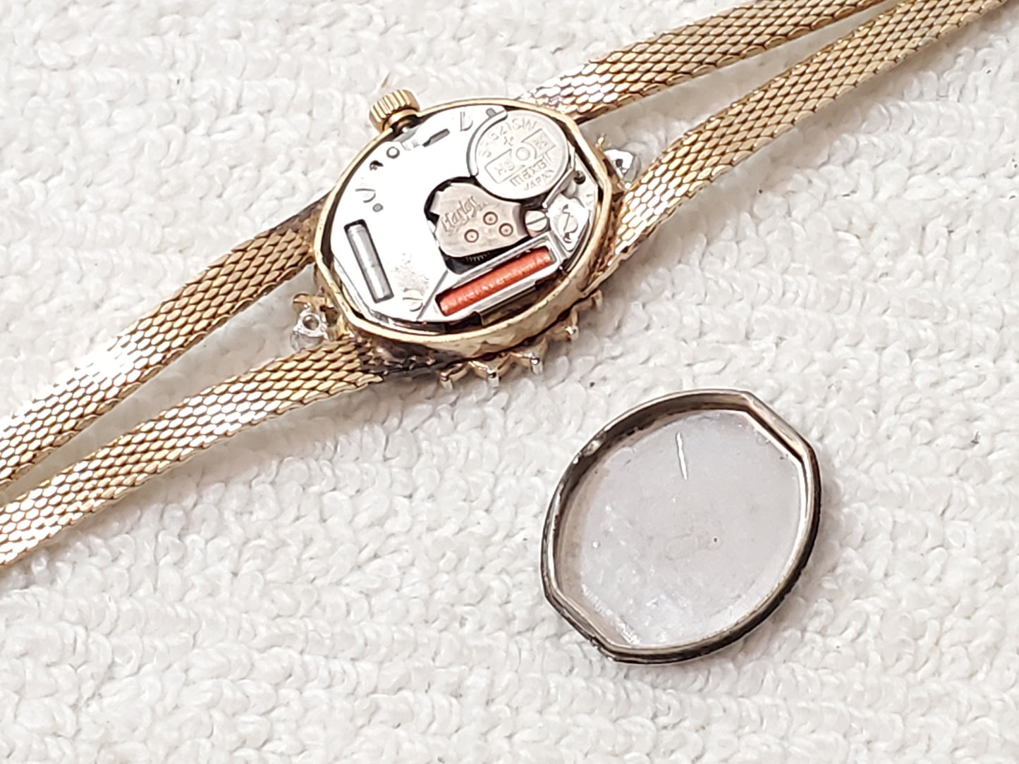 Armitron Deauville Vintage Gold Tone Women's Watch Diamonds Rubies Bezel 1 Jewel