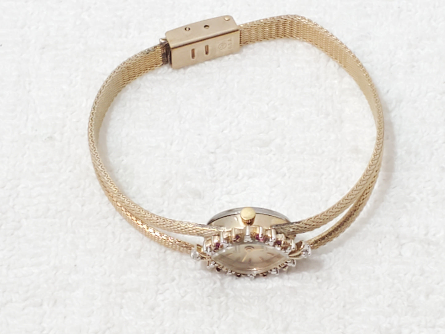 Armitron Deauville Vintage Gold Tone Women's Watch Diamonds Rubies Bezel 1 Jewel