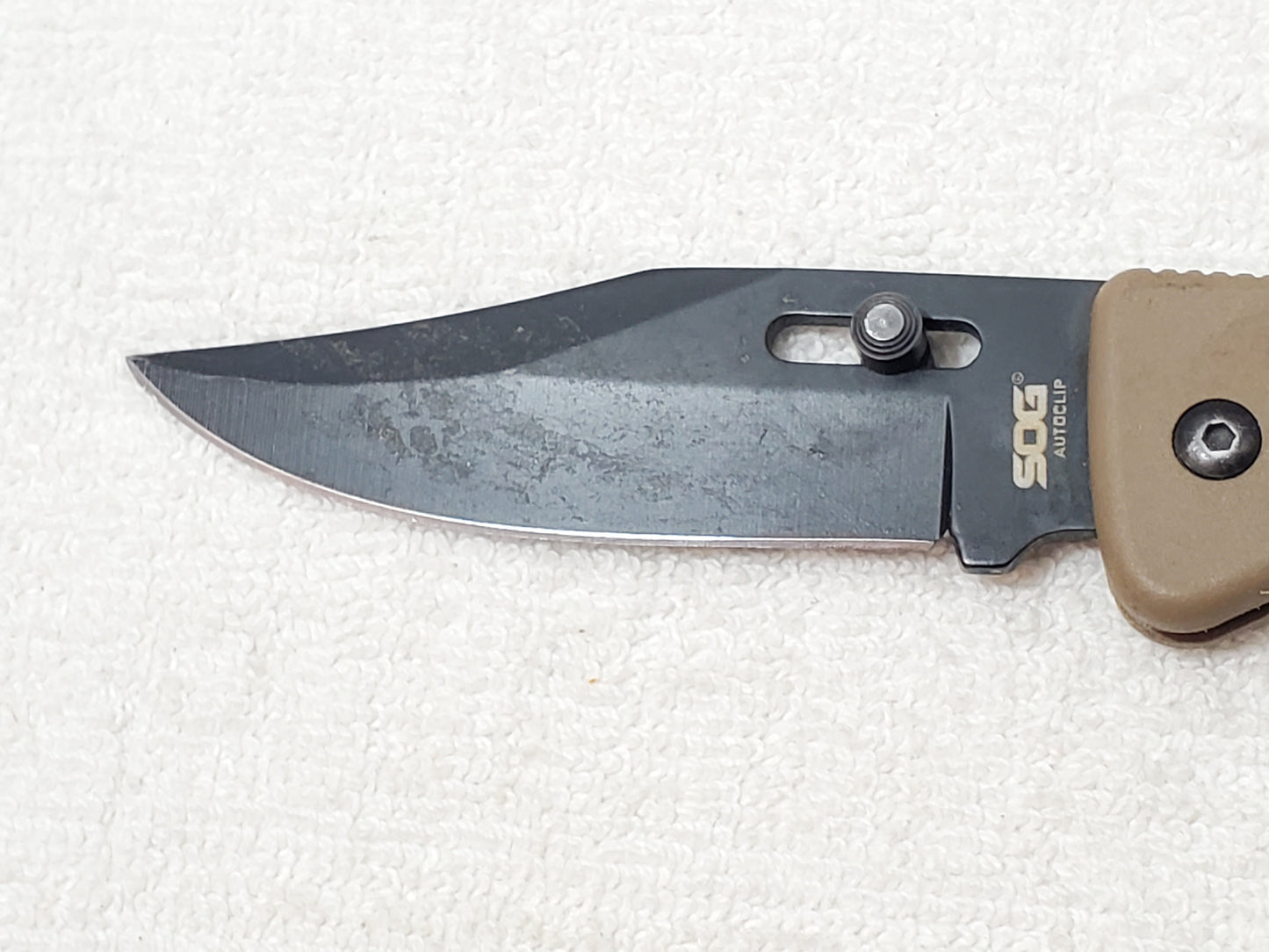 Vintage SOG Autoclip Pocket Knife Black Blade Coyote Tan Handle Discontinued
