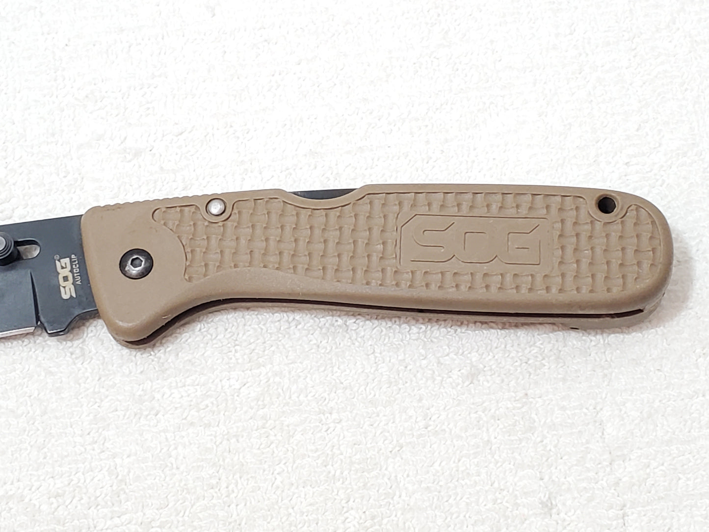 Vintage SOG Autoclip Pocket Knife Black Blade Coyote Tan Handle Discontinued