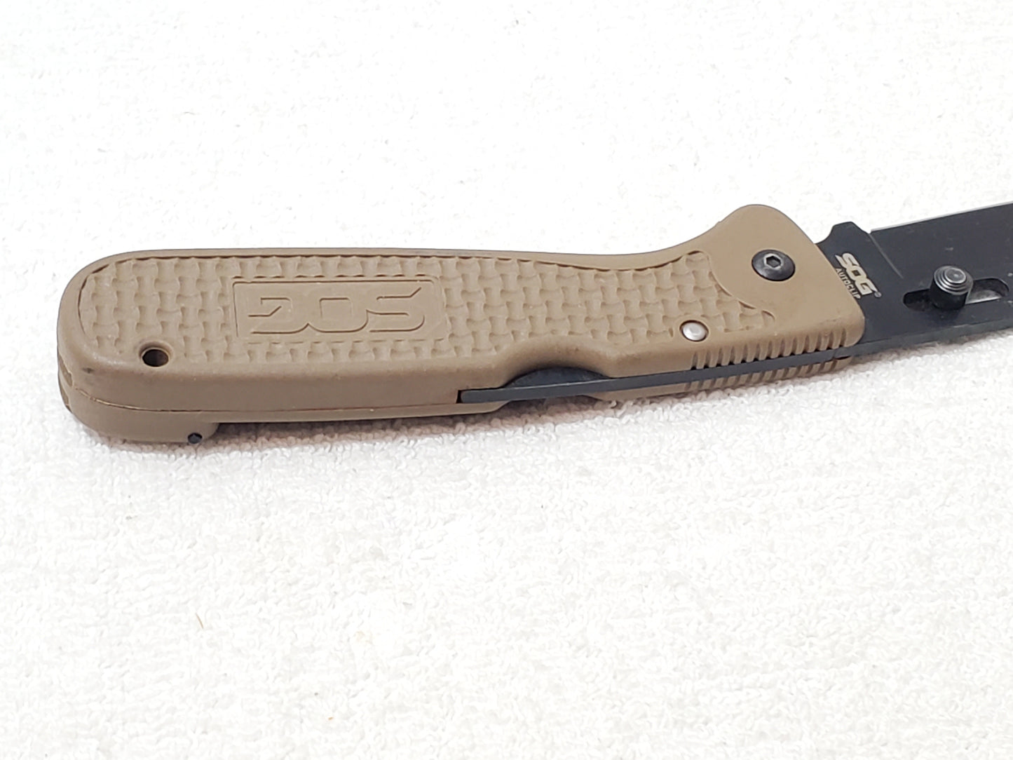 Vintage SOG Autoclip Pocket Knife Black Blade Coyote Tan Handle Discontinued