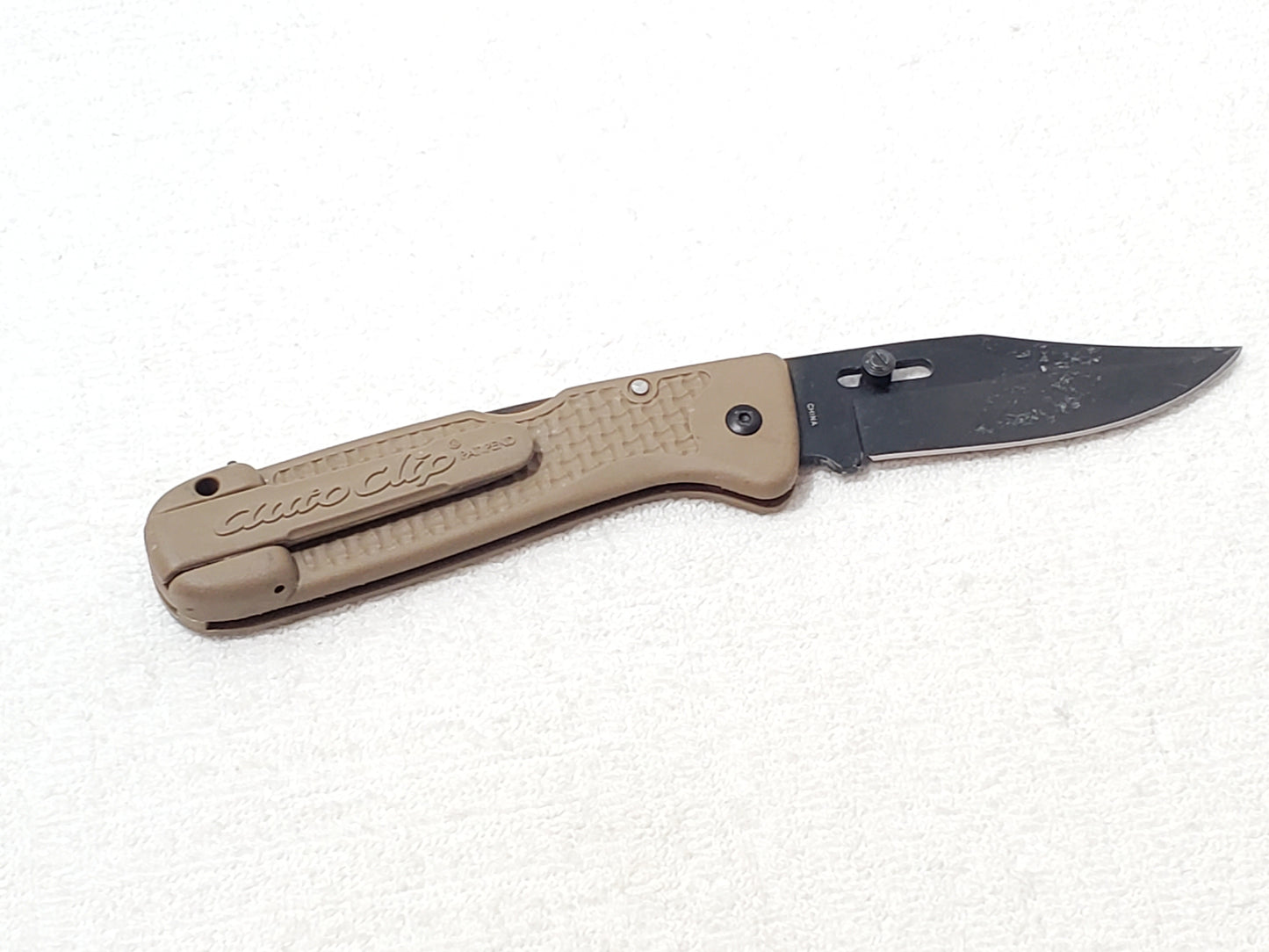 Vintage SOG Autoclip Pocket Knife Black Blade Coyote Tan Handle Discontinued