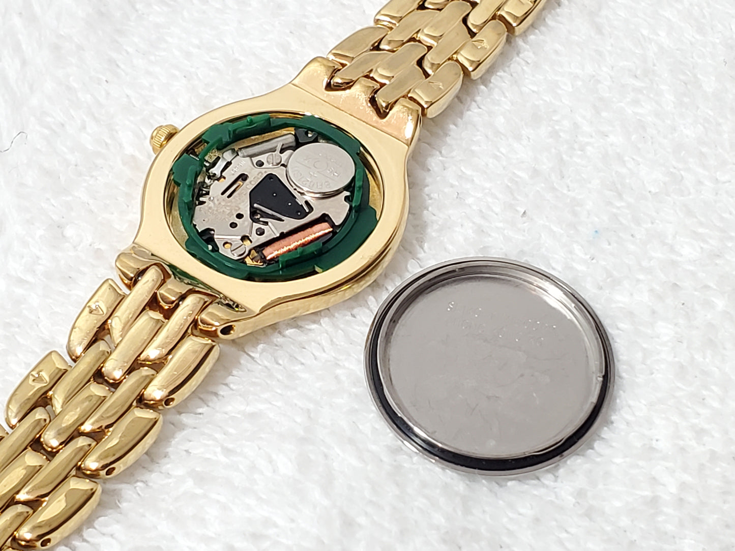 Vintage Seiko Gold Tone Plated Women's Date Watch White Dial Roman Numerals
