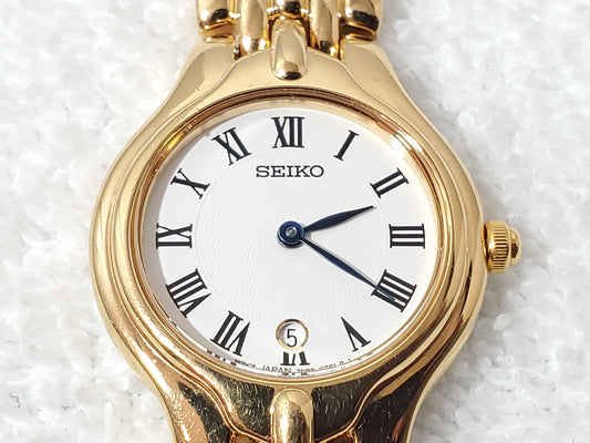 Vintage Seiko Gold Tone Plated Women's Date Watch White Dial Roman Numerals