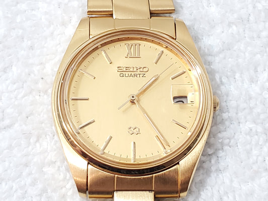 Seiko SQ Vintage Men's Gold Tone Date Quartz Watch Roman Numeral One Jewel
