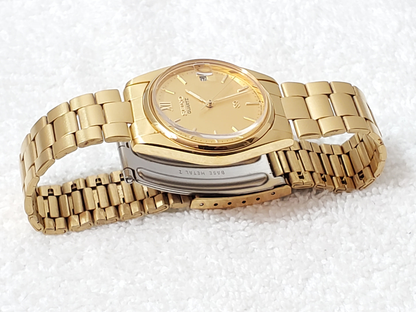 Seiko SQ Vintage Men's Gold Tone Date Quartz Watch Roman Numeral One Jewel