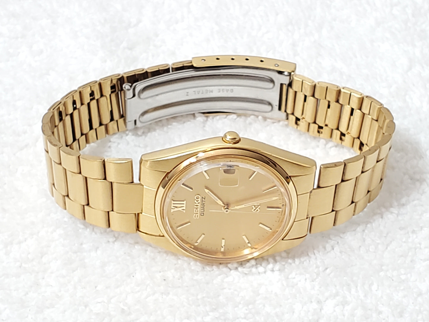 Seiko SQ Vintage Men's Gold Tone Date Quartz Watch Roman Numeral One Jewel