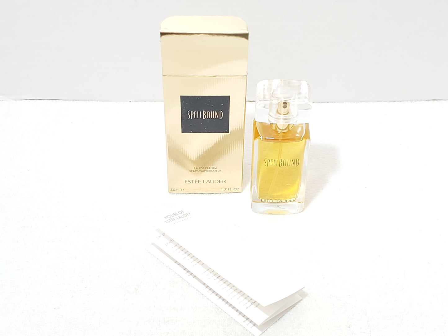 Estee Lauder Spellbound Eau de Parfum EDP Spray 1.7 oz 50ml Classic Gold Box NIB